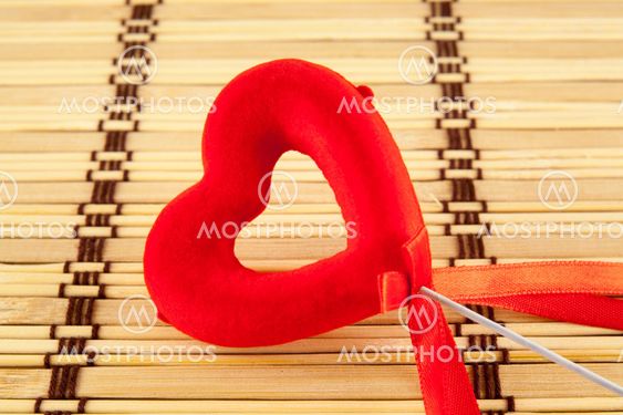 Valentine day concept - heart shaped lolly pop on wood...