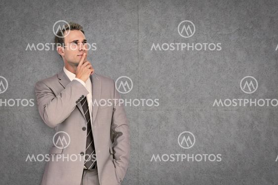 Composite image of thinking businessman