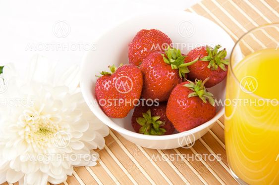 Breakfast with berries,orange juice and croissant