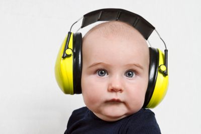 baby with ear protection