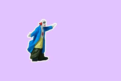 Miniature people toy figure photography. Side view full...