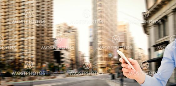 Composite image of man using smartphone