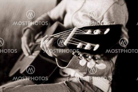 Playing guitar
