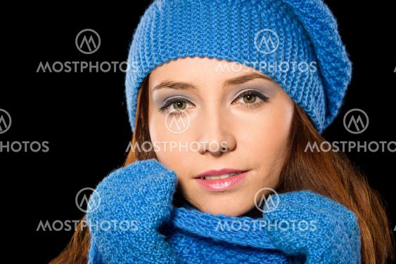 Young happy woman wearing winter cloth