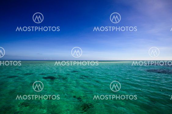 Beautiful Fiji atoll island with white beach