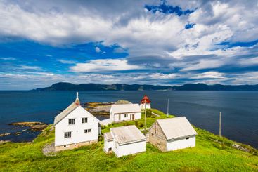 Scenic coastal view of traditional buildings and...