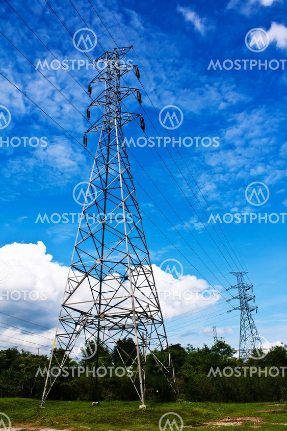high voltage post.High-voltage tower blue sky background.