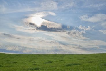 Nature, blue sky and grass field with clouds on farmland...