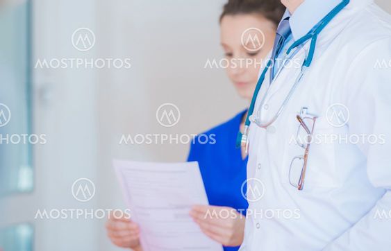 Medical Personel Inside Hospital Hallway