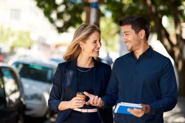 Commute, notebook and talking with business people in...