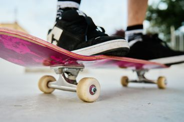 Close-Up of Skateboarder's Feet on Skateboard