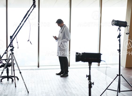doctor speaking on cellphone