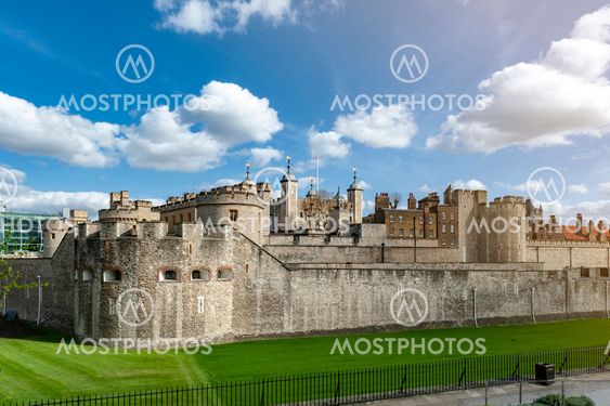 London, UK - April 2018: Exterior view of Her Majesty's Royal Palace and Fortress of the Tower of London, a historic castle and popular tourist attraction located on the north bank of the River Thames in central London, England