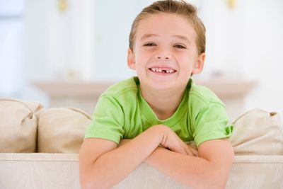 Young Boy Smiling At Camera