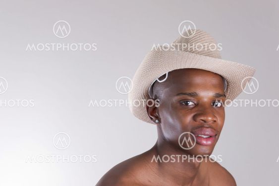 Young African man in a hat