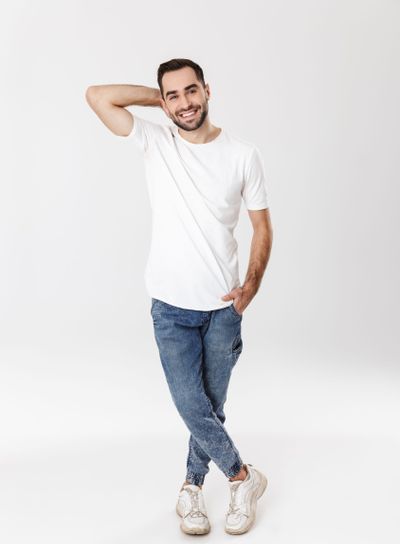 Full length of a handsome cheerful man