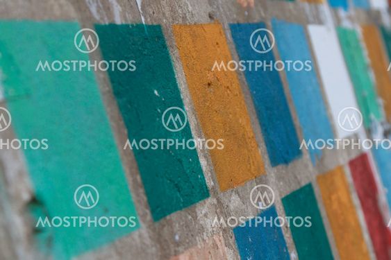 Coloured squares painted on a wall