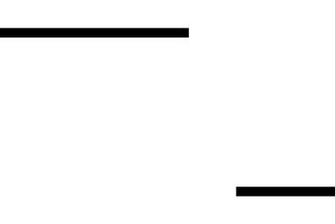 Remote worker sitting cross-legged and using a laptop...