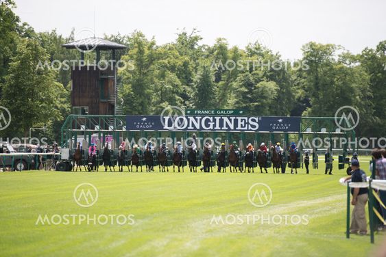 CHATILLY, FRANCE - JUNE 2013: Third Course of the Prize of Diane Longines on June 16, 2013 in Chantilly. Course name: Grand Handicap Longines.