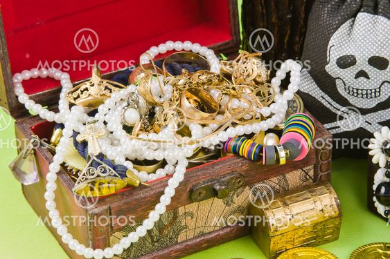 small box with treasures on a light green background