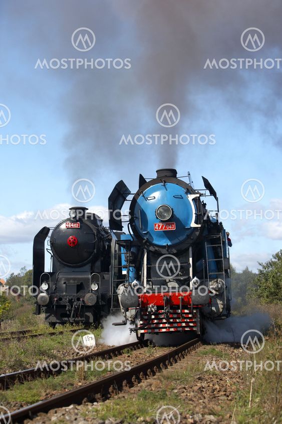 steam locomotive called Parrot 477.043 and steam locomotive 464.