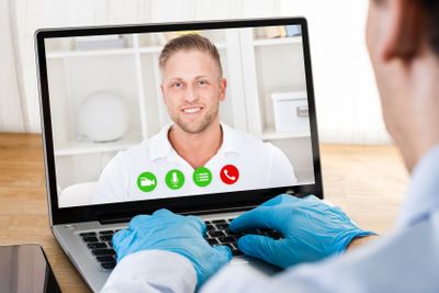 Man On Coronavirus Quarantine Calling Doctor