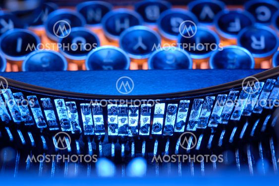 Typewriter keys and typebar in blue