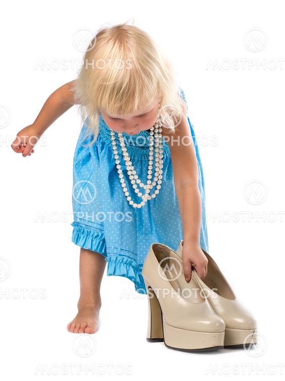 little girl with big shoes