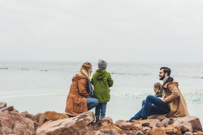 family spending time on seashore