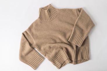 Soft sweater of light brown beige luxury natural...