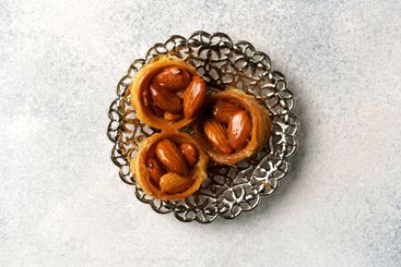 Delicious traditional pastry with almonds served on an...