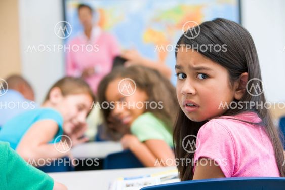 Elementary school pupil being bullied