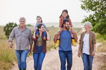 Family, walking and parents with children, piggyback and...