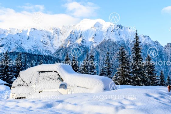 car blockaded in snow