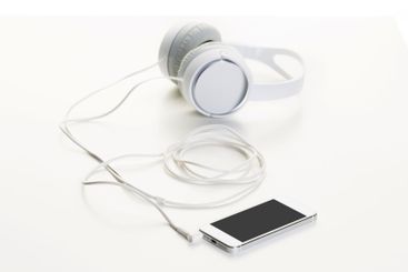 White headphones on white background close up