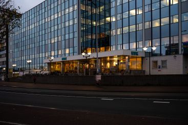 The KVK or Chamber of Commerce at dusk in Amsterdam, The...
