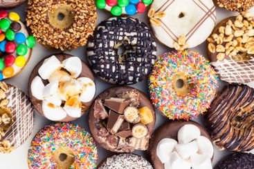 Close up of a selection of colorful donuts.