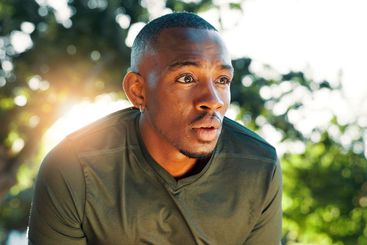 Exercise, running and tired with black man outdoor for...