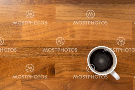 Serving coffee on a white cup