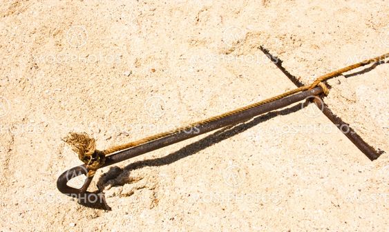 Old rusty anchor.