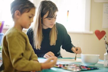 Painting, picture and art with teacher and child in...