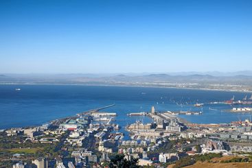 Aerial view of a city and ocean with harbor in Cape Town...
