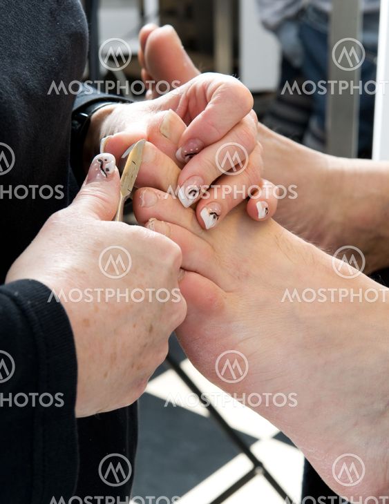 Foot Therapist working on a mans feet