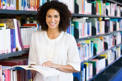 Woman reading in a library