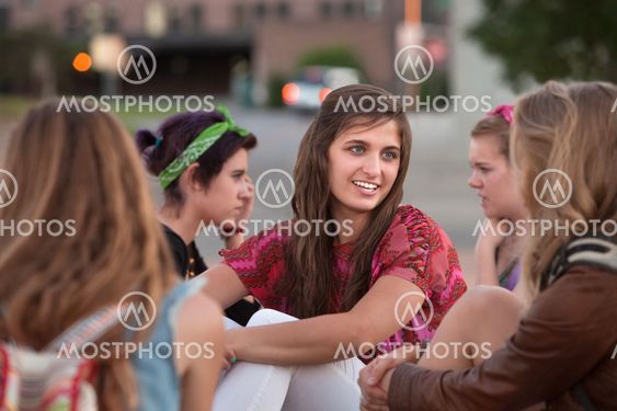 Five Girls Sitting Outside