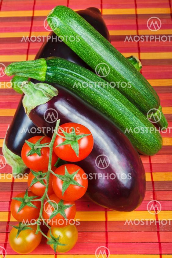 Zucchini tomatoes and eggplant close up