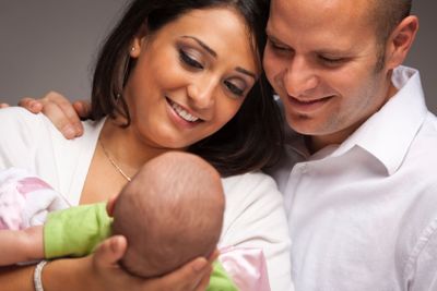 Mixed Race Young Family with Newborn Baby