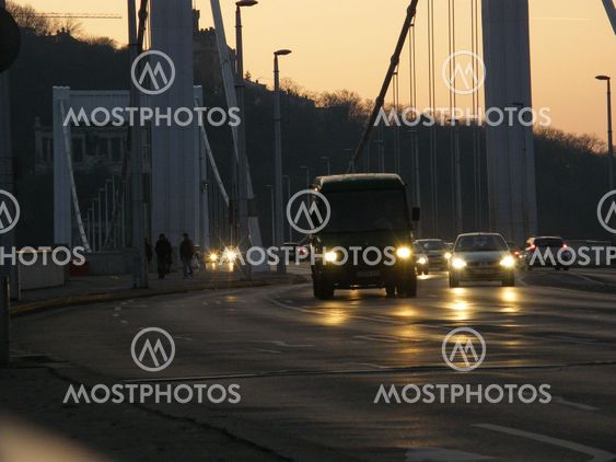 Traffic on bridge at dusk
