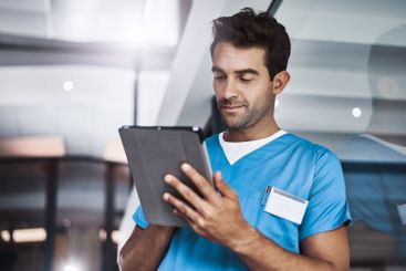 Male, nurse and tablet in clinic for health records,...