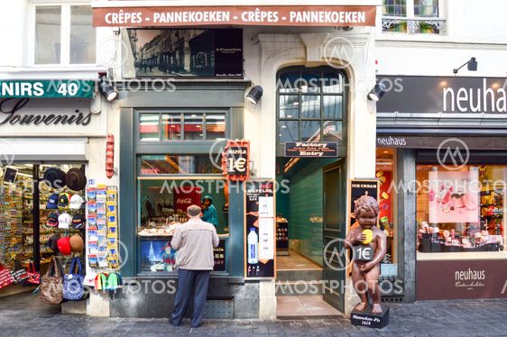 Brussels, Belgium - April 2015: Le Funambule, famous homemade waffle shop located at Grand Place next to Manneken Pis landmark in Brussels, Belgium